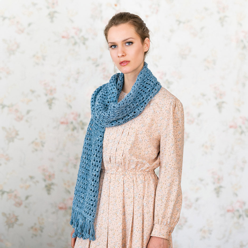 light blue afghan knit shawl