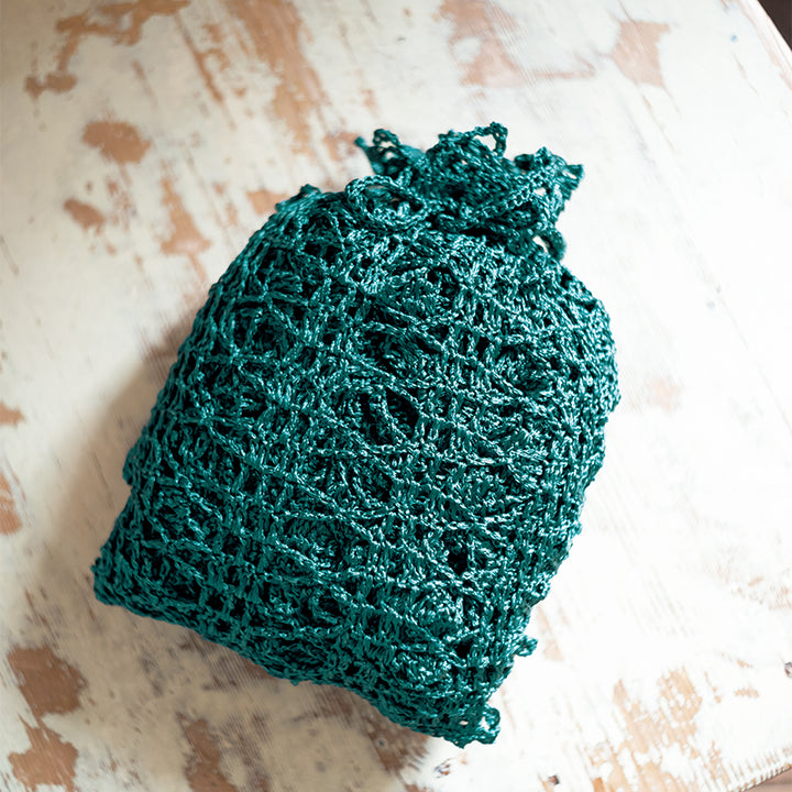green shawl and pouch