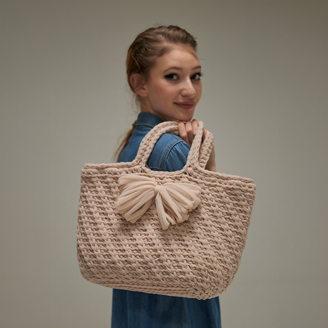 bag with beige ribbon