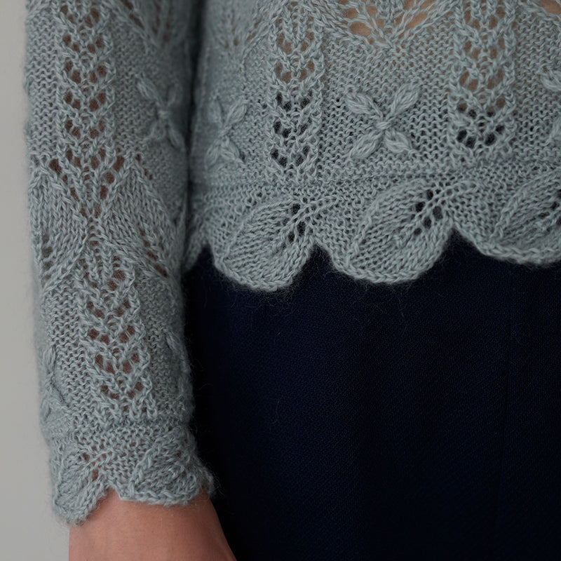 Scalloped pullover with flower and leaf pattern