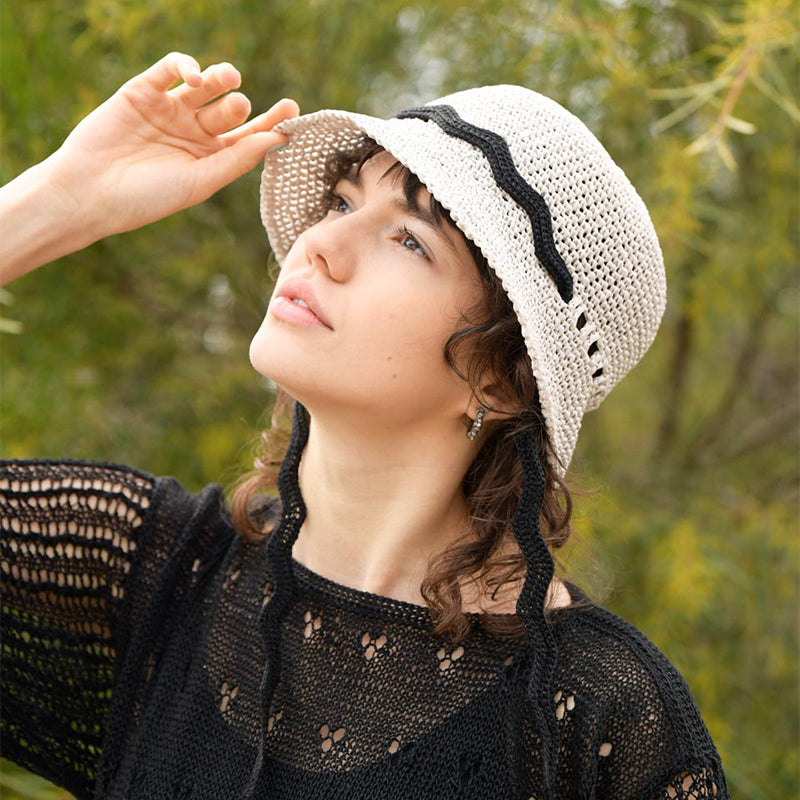 light gray hat